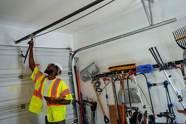 Professional Garage Door Roller Replacement technician working in Yellow Springs, OH